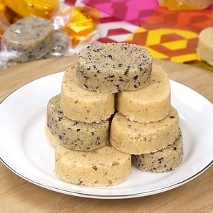 Polvoron is a Filipino-style shortbread made of toasted flour, powdered milk, sugar, and butter. Sweet, buttery, and easy to customize with different flavors, it’s a delicious snack or dessert and great for gift-giving, too! https://www.kawalingpinoy.com/polvoron/ | Kawaling Pinoy Recipe Blog
