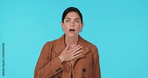 Woman, wow face with drama and announcement with shocked reaction, emoji and alarm on blue background. Female person, surprise expression and hearing gossip with mockup space and mind blown in studio