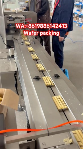 Do you know the egg rolls packing machine? #packagemachine #package #eggrolls #kitkat