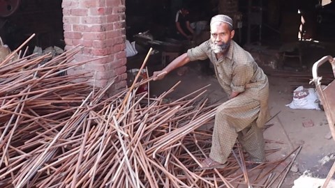 Hexagonal Nuts Made from Rusty Iron Rods Process