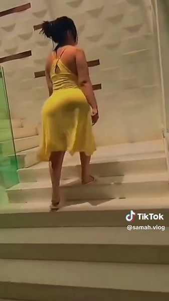 Stunning Indoor Staircase Walk with Stylish Yellow Dress