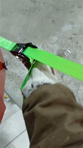 ratchet straps hooked to the tool box trying to pull it onto the liftgate