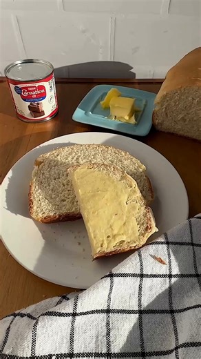 You’re one ingredient away from the fluffiest homemade bread! 😋🍞 It's Carnation Milk! Makes 1 loaf Ingredients 1 ¼ teaspoon instant yeast 1 ½ teaspoons sugar 1 cup warm water (105 degrees) ¼ cup salted butter, melted, divided 2 Tablespoons sugar ¼ cup Carnation Evaporated Milk 1 teaspoon salt 3 ½ cups Bread flour, or all-purpose Oil for the bowl How to make homemade bread with evaporated milk 1. In a small bowl, add the instant yeast, sugar, and warm water. Whisk using a spatula until combined