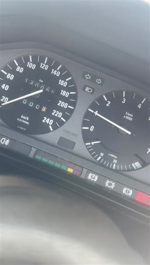 Car Dashboard Close-Up: Speedometer and Tachometer Details