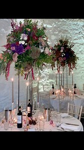 ✨ Helen & James | The Wedding Breakfast at Askham Hall ✨As guests entered the wedding breakfast at the beautiful Askham Hall, the barn had transformed into the most romantic autumn setting — glowing with candlelight and filled with the fragrance of fresh flowers. 🍂✨We re-purposed the ceremony arrangements into tall, graceful bell jar designs that stood proudly on some of the tables, adding height, texture and warmth to the room. Helen’s bridal bouquet and her bridesmaids’ bouquets were also giv