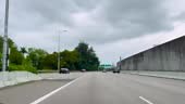 Multi-lane highway driving, car point of view.