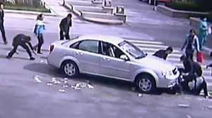 Bystanders Go to Grab Cash After Accident
