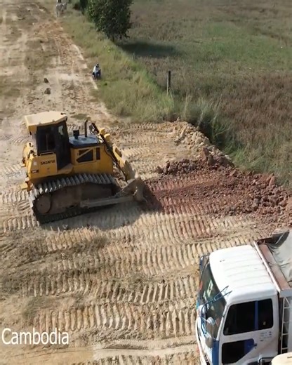 51K views · 664 reactions | Building a Village Road: Skilled Operators Use Shantui Dozer and Trucks to Move Soil | Bulldozer Cambodia | Facebook