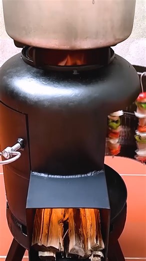 23K views · 198 reactions | How to make a very effective 2 in 1 wood stove from an old gas tank. | Genius Crafts | Facebook