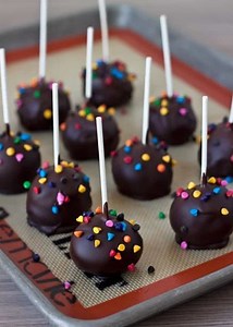 This easy brownie cake pops recipe is perfect for most any holiday or party. Brownie cake pops start with a brownie mix, so they’re super easy to make. Then you dip the brownie balls in chocolate and add fun sprinkles, making them pretty much irresistible. Find the recipe here: https://www.barbarabakes.com/easy-brownie-cake-pops/ | Barbara Bakes | Facebook