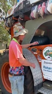 Travelling Jackaroo Sam Hughes drives tractor for charity, raises nearly $250k