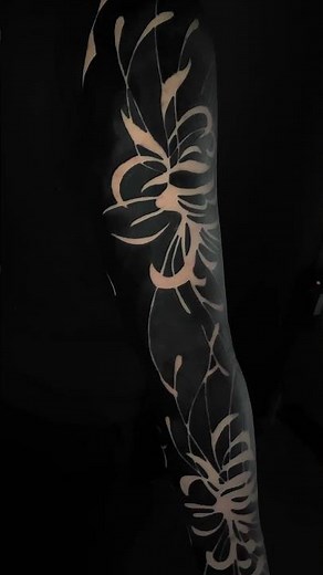 full black sleeve white flower tattoo