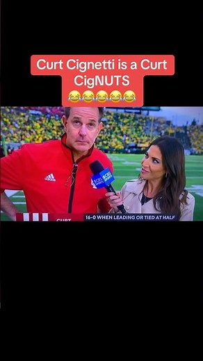 Curt Cignetti with his Curt Cignetti Comedy talking with Jenny Dell of Indiana at Oregon halftime