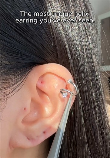 The most unique helix earring you’ve ever seen 👀 Not a stud. Not a hoop. It’s a spiral helix 🌀 Would you wear this? Shop now at www.impuria.com (Search Spiral) ✨ #helixpiercing #earcuration #earstack #earpiercings #cartilagepiercings