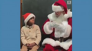 Santa uses sign language to communicate with deaf and hard of hearing children