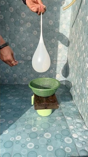 Experiment: Will a water balloon explode when it rolls down from a tall building?💥🎈#satisfying
