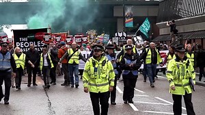 Protesters march through Manchester as Conservative Party annual conference begins