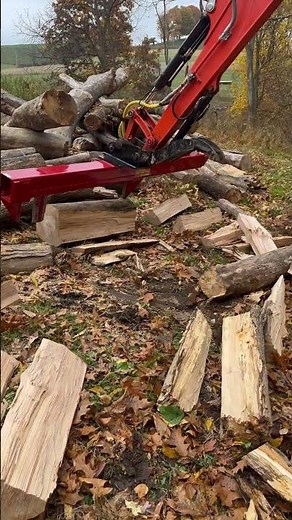 Splitting wood with Kubota excavator