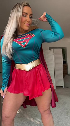 Pretty Supergirl Cosplay and Biceps Flexing