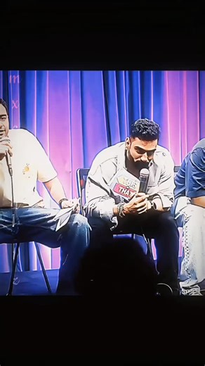 the 50 show on Instagram: "GEN Z ZOKE 😂😁 Use the uploaded photo as the single and exclusive facial reference. Absolute face lock. Preserve identity with zero deviation: identical eyes, eyelids, brows, nose structure, lips, jawline, cheekbones, facial proportions, skin texture, pores, facial hair density, beard shape, hairline, and hairstyle. No beautification, no symmetry correction, no smoothing, no stylization. No identity drift under any condition Create a Ultra-realistic cinematic night po