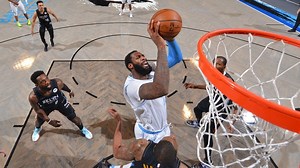 Shorthanded Lakers steal win vs. Nets