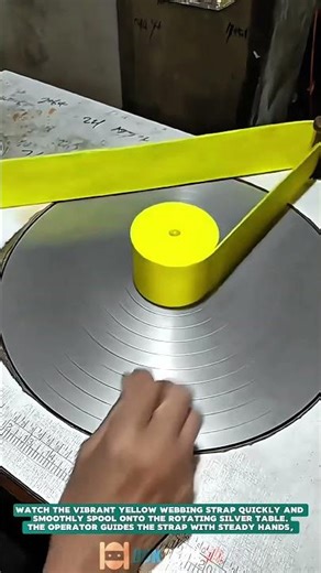 Rolling Yellow Webbing Straps Neatly – Satisfying Jobs and Machinery in the World