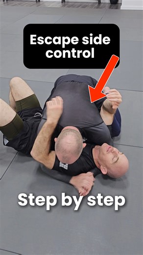 🔄 Bottom Side Control to Armbar Attack! 🔄 Professor Brian turns defense into offense—escape bottom side control and flow straight into an armbar submission: 1️⃣ V-Grip on Shoulder – Secure hands on opponent's top shoulder with a strong V-grip. 2️⃣ Bridge & Hide Head – Bridge toward them to create a void, then tuck your head into the space for a frame. 3️⃣ Block Far Hip – Maintain the frame, block their far-side hip as you shrimp your lower body away. 4️⃣ Knee Inside Frame – Insert your knee as