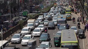 Highly traffic jams on the Dhaka city highway road in the morning time. Every day thousands of intercity transports are crossing on this highway road.