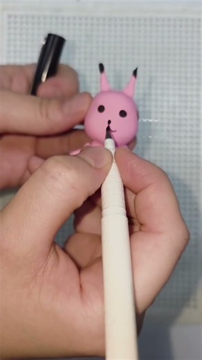 How to sculpt a pink squirrel from plasticine.