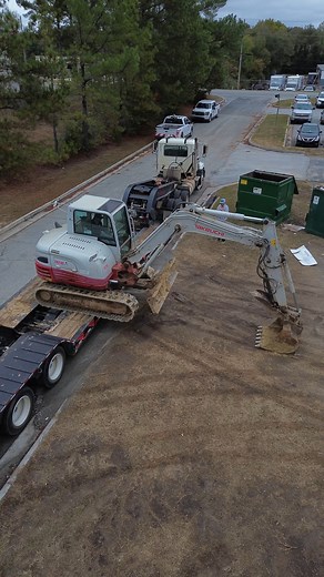  A Takeuchi mini excavator joins the job mid-project to finish...