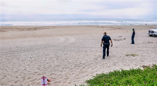 Body Of Missing Triathlete Discovered After Being Spotted In Shark's Mouth