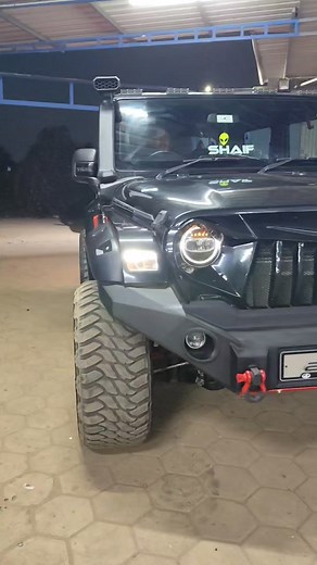 Enhanced Mahindra Thar with R20 Alloy Wheels, Oversized Tires, and 6-Inch Fibre Fenders for Aggressive Stance & Improved Handling. Featuring a Proman Body Lift Kit for Increased Ground Clearance & Reduced Wobble, Black Front & Rear Bumpers, ,Hardtop are mat black Painted and Premium Rexin Interior work done . Contact Fibresmith at 09994057574 for Custom Thar Modifications | Fibre Smith - Jeep Modification & Customisation