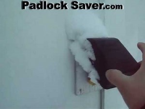 Padlock covers shielding lock from winter snow