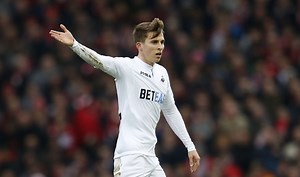 Swansea's Tom Carroll admits he's still in Tottenham's WhatsApp group ahead of strange reunion