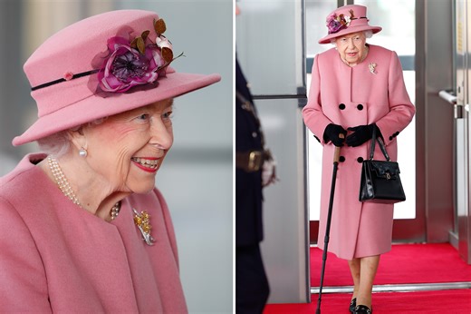 Queen, 95, wears pink and uses walking stick as she attends at Welsh parliament