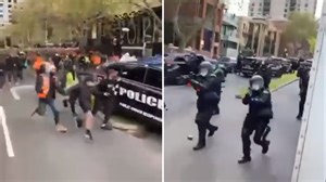 Wild scenes as protesters ambush police officers in Melbourne