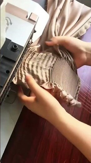 Stretching fabric with elastic threads to create a smocked pattern #popular #stretching #machine