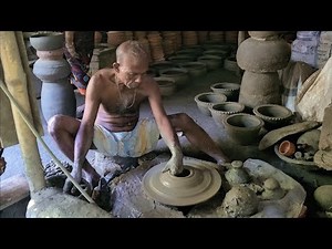 Old Potter Making A Claypot By Hand