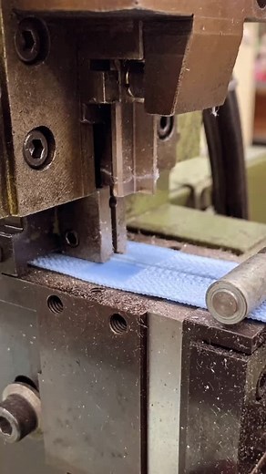 With luxury zipper design, every component has a story—and the separating zipper is no exception. Creating your own isn’t as simple DIY; it takes precision machinery. First, a machine cuts the exact opening for the pin and box. Then, as you’ll see in the next clip, another machine installs them with flawless accuracy—ensuring the smooth glide and secure close that high-end fashion demands. Because when it comes to luxury, every detail matters. | UCAN Zippers USA