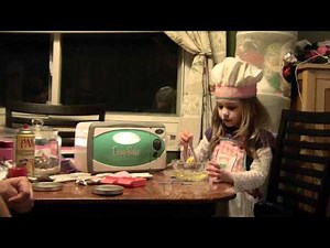 Zoe cooks with an Easy Bake Oven (part 1 of 3)
