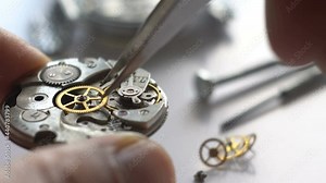 Watchmaker repair mechanical watches. Gears repair. Watch repair process
