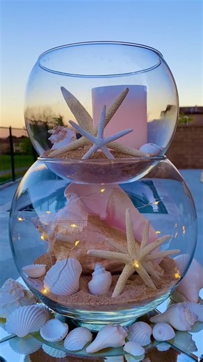 DIY Fish Bowl Centerpieces: Stacked Fish Bowls with Seashells and Starfish
