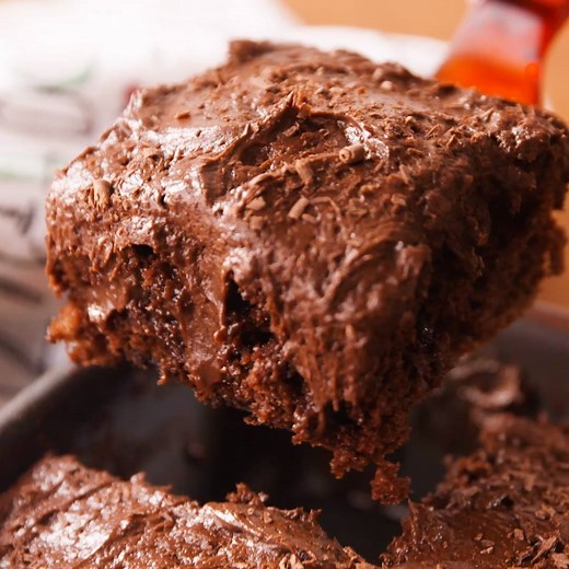 WARNING: Death By Chocolate Poke Cake will result in a serious food coma. Full recipe: http://dlsh.it/y8g2xSZ | Delish