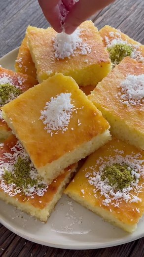 Ramadan Series- Revani A classic syrup soaked Turkish semolina cake. I’m all about syrup soaked desserts, gimme baklava, basbousa, qarayef and this revani everyday and I’ll be happy. Enjoy! #ramadanrecipes #turkishfood #turkishrecipes #turkishdessert #revani #semolinacake Ingredients Simple Syrup ▢ 2 cups granulated sugar ▢ 2 cups water ▢ ½ lemon juice of Cake ▢ 3 large eggs room temperature ▢ ⅔ cup granulated sugar ▢ 1 teaspoon vanilla extract ▢ ½ cup vegetable oil see notes ▢ 1 cup plain yogur