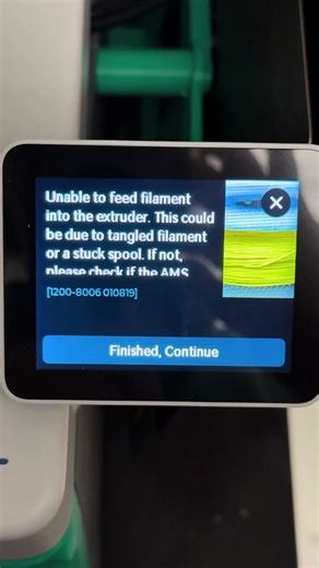 If filament suddenly won’t extrude, it’s often a tiny piece stuck in the AMS feeder path. Pulled it out, screwed everything back in place, hit resume… and we were right back to printing ✨ #3dprinter #3DPrinting #MakerLife #makersgonnamake #homebasedbusiness