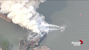 Vancouver fireboat battles large barge fire on Fraser River