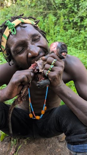 Hunters enjoying monkey meat 😋🔥 so delicious