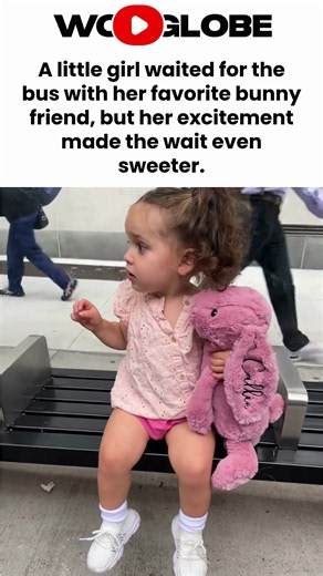 At a NYC bus stop, a little girl excitedly plans a museum trip with her bunny