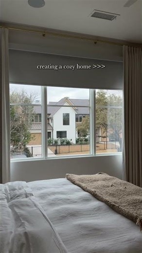 Custom window shades bring warmth and balance to the home