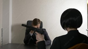 a man in a suit asks questions to a brunette woman in an interview. 4k. interview. recruitment